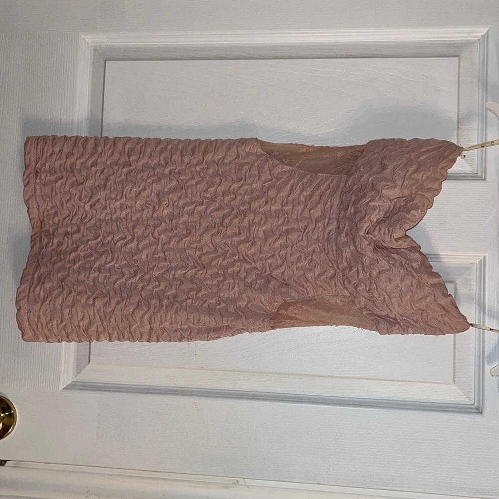 Selling ruffled, short light pink dress with some lace accents